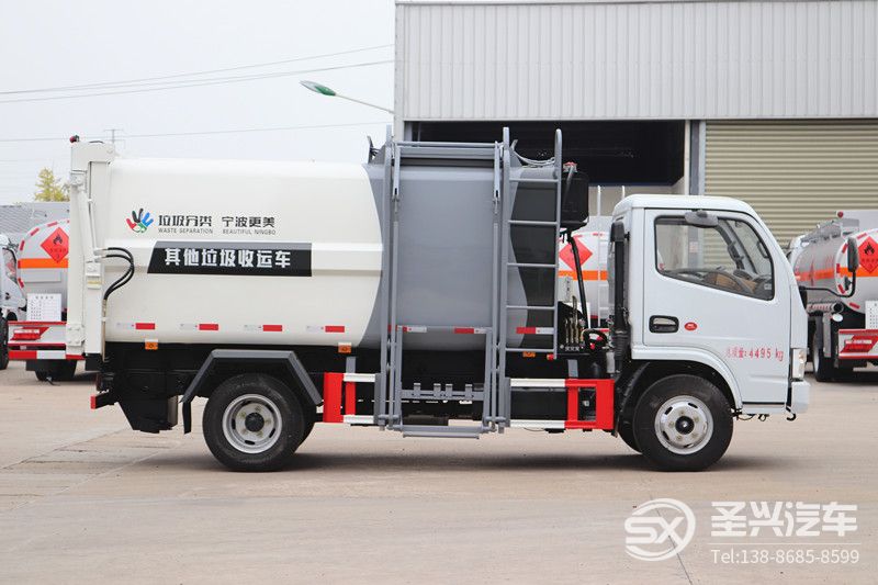 全新款東風多利卡側(cè)裝掛桶壓縮垃圾車