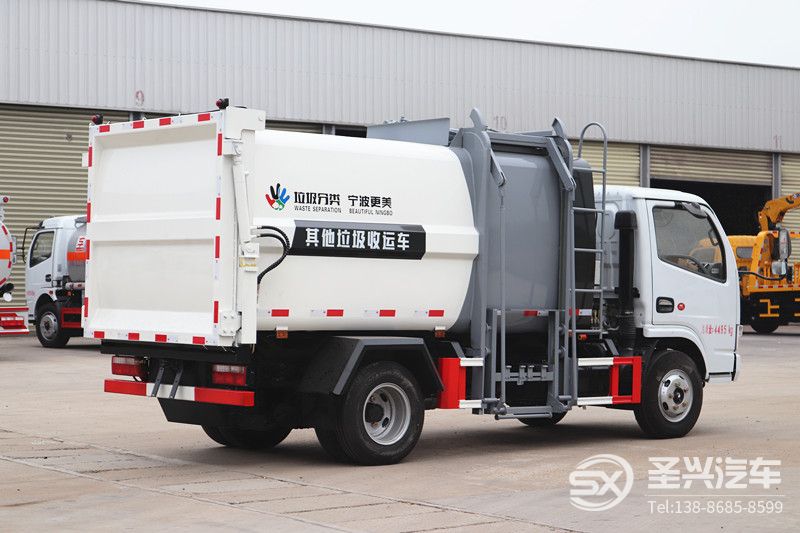 全新款東風多利卡側(cè)裝掛桶壓縮垃圾車