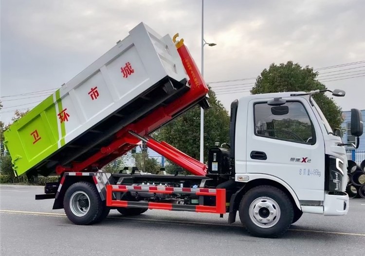 奧馳X2藍(lán)牌(地庫)勾臂垃圾車 7方建筑垃圾箱